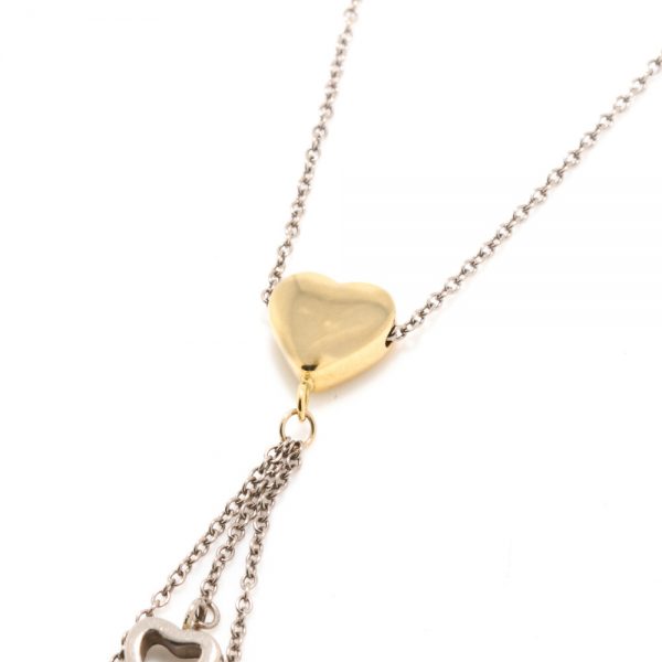Tiffany and Co 18ct Yellow and White Gold Necklace with Heart Charm Pendants; Made in London, Circa 2000s, Comes in original Tiffany & Co travel pouch