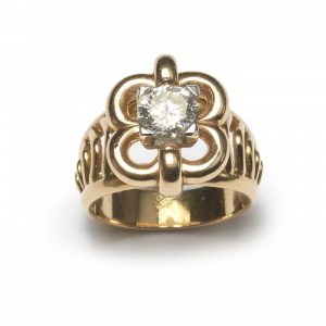 Vintage French 0.91ct Diamond Solitaire Dress Ring; single round brilliant-cut diamond, claw set within open floral frame with cut-out shoulders, in yellow gold, Circa 1950