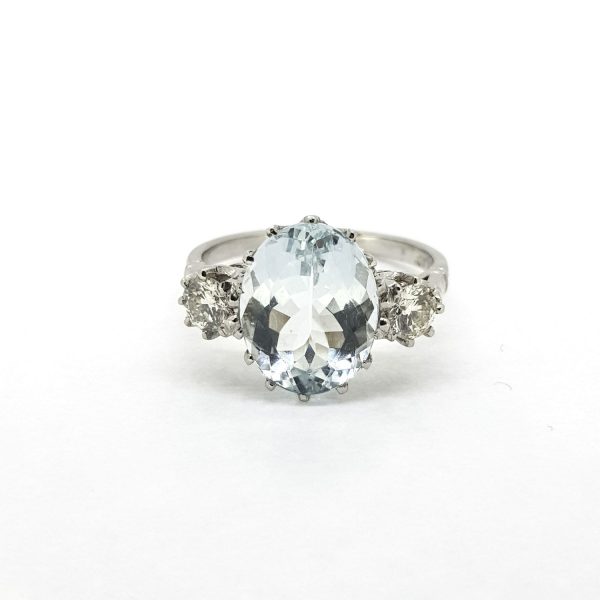 4.5ct Oval Cut Aquamarine and Diamond Three Stone Ring in Platinum