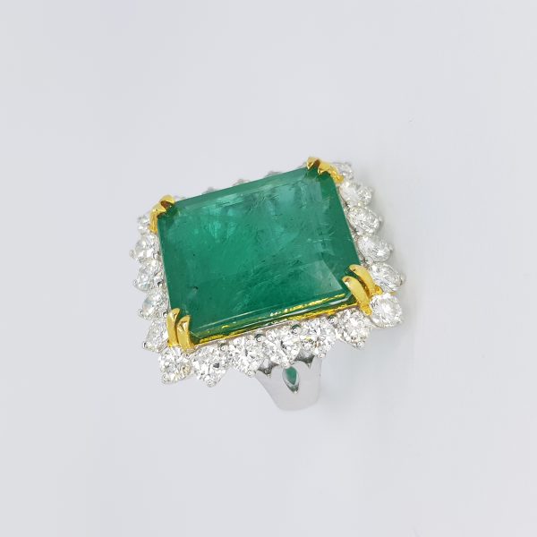 Zambian Emerald and Diamond Cluster Dress Ring; large 22.37ct certified natural Zambian emerald-cut emerald within a 2.30ct diamond surround, in 18ct gold