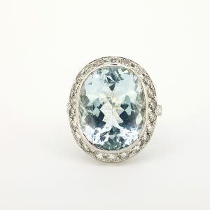 22 carat Aquamarine and Diamond Oval Cluster Ring