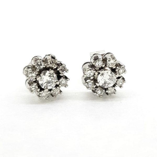 Diamond Flower Cluster Stud Earrings, 1.00 carat total, each nine-stone earring features a central diamond within a diamond surround, in 18ct white gold