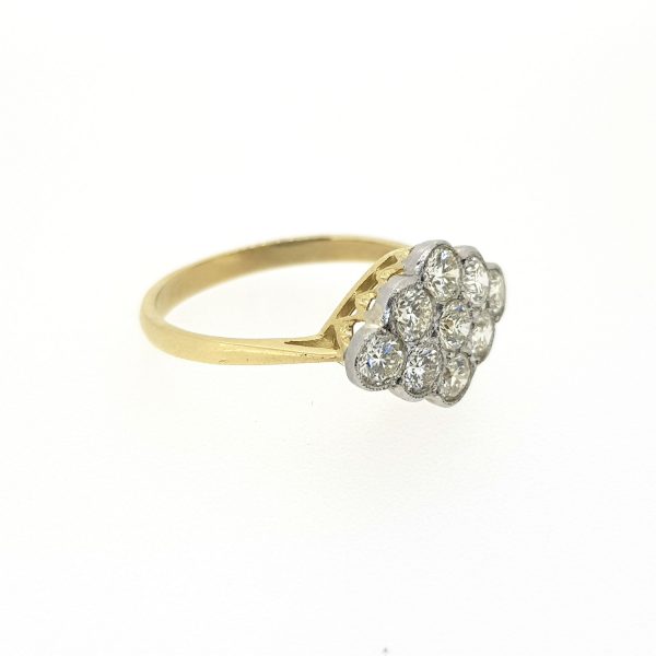 Contemporary Nine Stone Diamond Cluster Ring, 0.90 carat total, set in platinum with millegrain edging, mounted to a plain 18ct yellow gold band