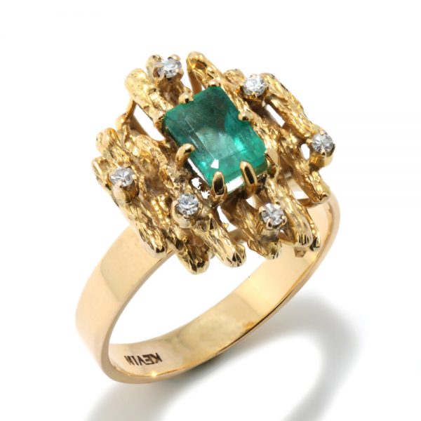 Contemporary Emerald and Diamond Cluster Ring; modernist 14ct yellow gold ring set with a central 1ct emerald decorated with diamonds, Signed KEVIN, Circa 1990s