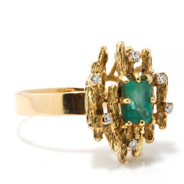 Contemporary Emerald and Diamond Cluster Ring; modernist 14ct yellow gold ring set with a central 1ct emerald decorated with diamonds, Signed KEVIN, Circa 1990s