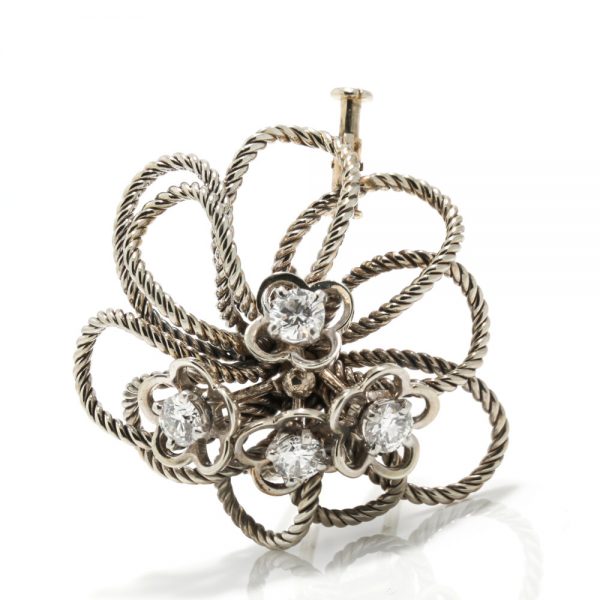 Vintage Boucheron Platinum and Diamond Floral Brooch; platinum twisted rope floral design, 4 central flowers each set with a 0.33ct brilliant-cut diamond, Circa 1950s
