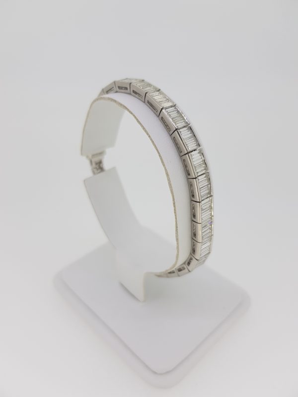 Baguette Cut Diamond Line Bracelet in 18ct White Gold, 6.52 carat total, comprised of 18ct white gold links set with 6.52cts baguette-cut diamonds