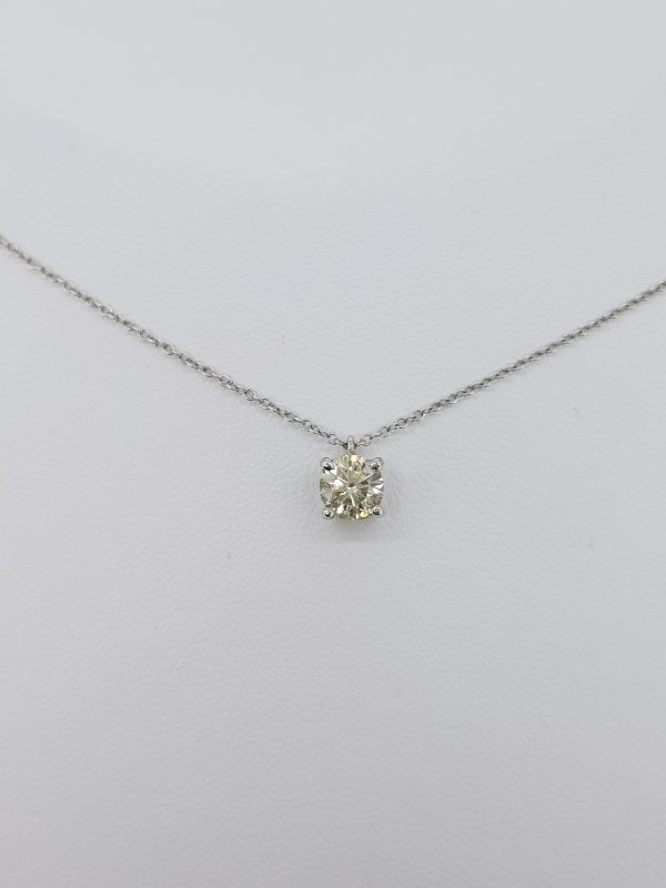 Single Stone Diamond Solitaire Pendant on Chain; featuring a 0.69 carat round brilliant-cut diamond, six-claw set in 18ct white gold