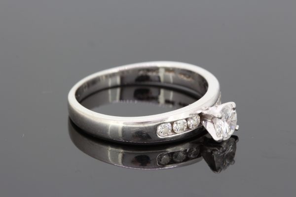 0.45ct Diamond Ring with Channel Set Diamond Shoulders in Platinum