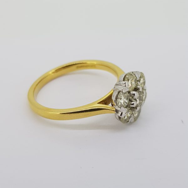 Edwardian Style Diamond Floral Cluster Ring, 1.05 carat total, seven diamonds collet set in a flower cluster, in 18ct gold