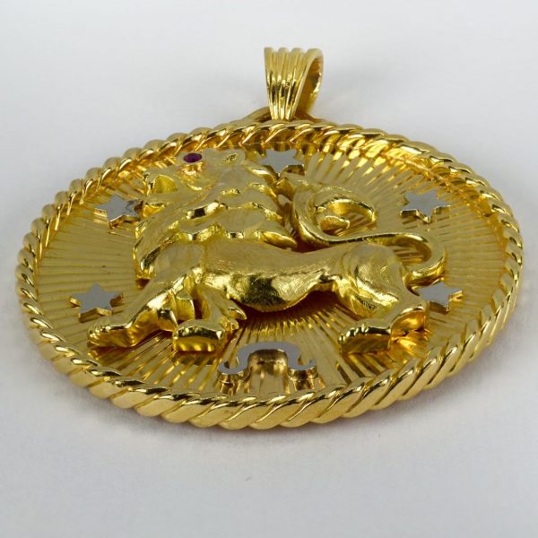 French 18ct Yellow Gold Zodiac Leo Pendant Charm; three-dimensional lion with ruby eye and white gold stars