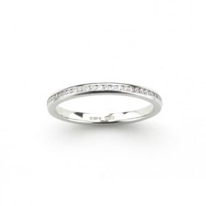 Diamond Full Eternity Ring in Platinum; set with 0.28 carats of round brilliant cut diamonds in a channel tension setting