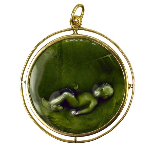 Green Enamel and 18ct Yellow Gold Baby Infant Charm Pendant; depicting a baby in an infant’s crib with rays of light streaming down onto it from a star