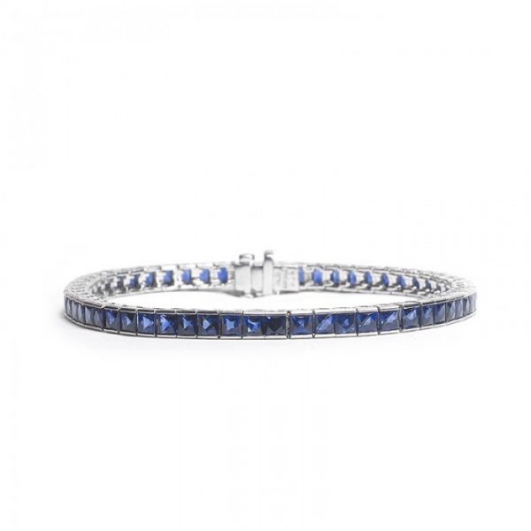 Princess Cut Sapphire Line Bracelet in Platinum; channel-set with 12.87cts square-cut sapphires