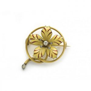 Antique Victorian Enamel, Diamond and Gold Flower Brooch; cream and red enamelled petals, an old-cut diamond in the centre and rose-cut diamond set stamens, Circa 1890