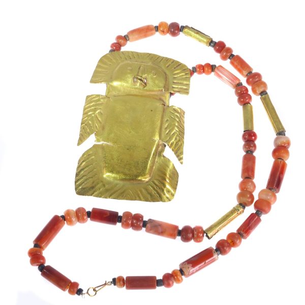 Pre-Columbian Gold Pendant with Carnelian Necklace, 1200 Years Old, gold sheet finely hammered into a bird with spread wings and tail, on carnelian beaded necklace, Circa 400 CE