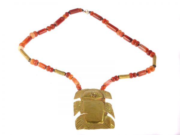 Pre-Columbian Gold Pendant with Carnelian Necklace, 1200 Years Old, gold sheet finely hammered into a bird with spread wings and tail, on carnelian beaded necklace, Circa 400 CE