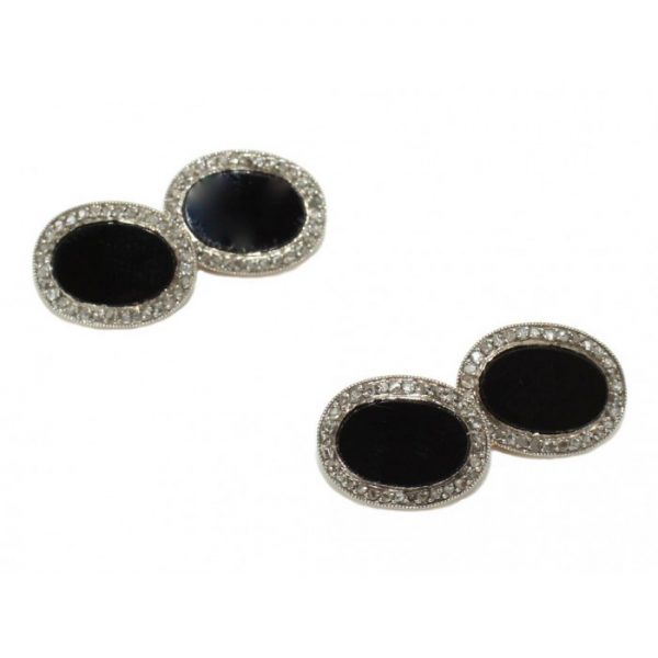 Art Deco Black Onyx and Diamond Cufflinks; central oval piece of black onyx with a pavé set diamond surround, Circa 1930