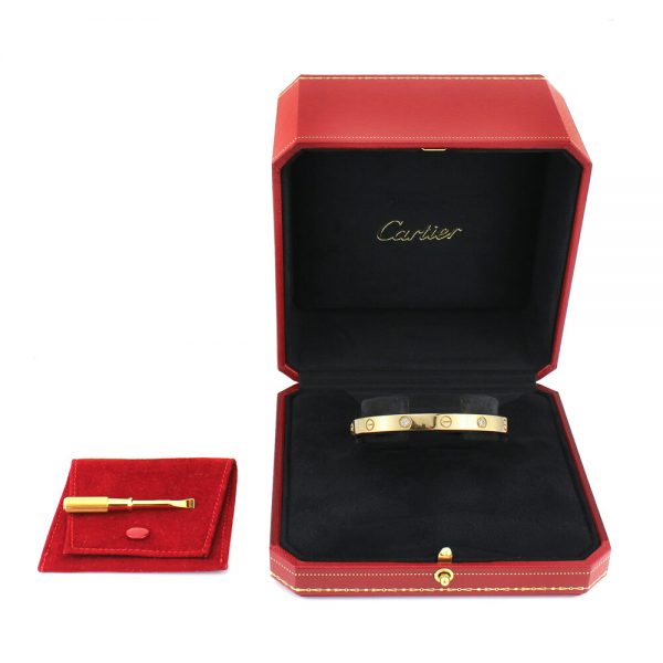 Cartier 18ct Rose Gold Love Bangle Bracelet set with four brilliant cut diamonds, Circa 2000s. Comes with Cartier box, gold screwdriver and certificate / insurance valuation from Cartier in Harrods London