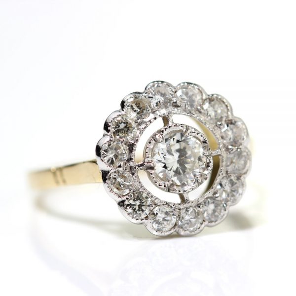 Diamond Floral Cluster Ring; 1.38 carat total, central 0.40ct G VS1 brilliant-cut diamond within diamond fixed halo surround, in 18ct yellow gold