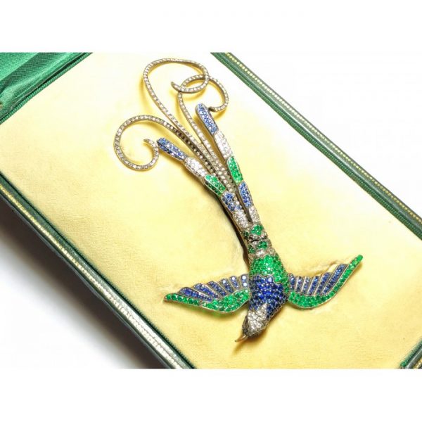 Sapphire, Emerald and Diamond Bird of Paradise Brooch, with ruby eyes, in silver upon gold