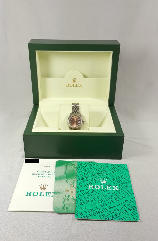 Rolex Lady Datejust 79174 with Original Diamond Set Copper Dial; 26mm stainless steel case with white gold bezel, automatic, self-winding movement, Circa 2002. Comes with Rolex box and papers