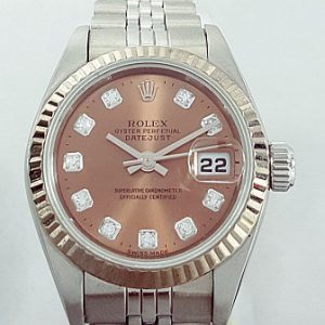 Rolex Lady Datejust 79174 with Original Diamond Set Copper Dial; 26mm stainless steel case with white gold bezel features a rare copper dial with original factory set diamond hour markers, magnified date, screw-locked crown, sapphire crystal, automatic, self-winding movement, on a stainless steel Jubilee bracelet. Circa 2002. Comes with Rolex box and papers.