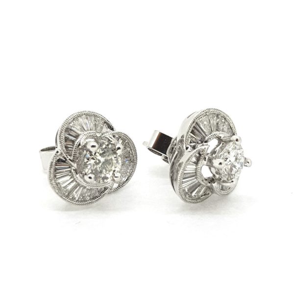 Baguette and Brilliant Diamond Floral Cluster Stud Earrings; central 1.02ct round brilliant-cut diamonds surrounded by 1.20cts baguette-cut diamond arranged to emulate delicate petals of a flower, 2.22 carat total, in 18ct white gold