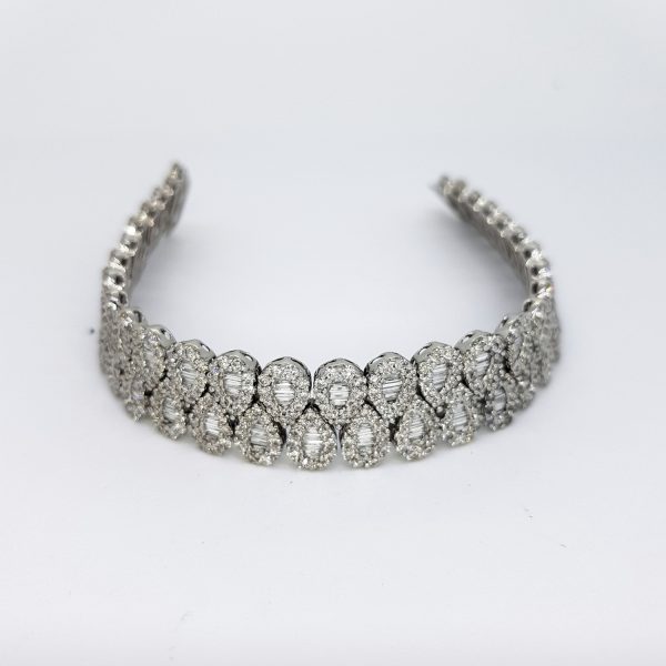Contemporary Diamond Bracelet in 18ct White Gold, 16 carat total, pear-shaped clusters comprised of baguette and brilliant cut diamonds, assessed 16.35 carats