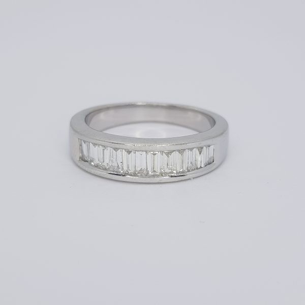 Baguette Cut Diamond Half Eternity Ring, channel-set with 0.96 carats of baguette-cut diamonds, in 18ct white gold