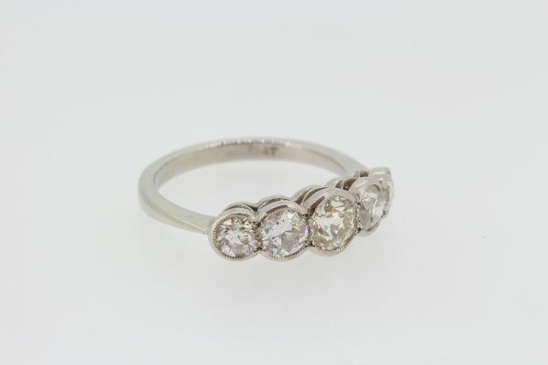 Five Stone Diamond Ring; featuring five graduated brilliant-cut diamonds collet set in 18ct white gold