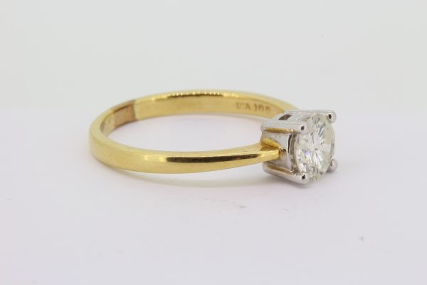 Classic Single Stone Diamond Solitaire Engagement Ring; 1ct round brilliant-cut diamond, four-claw set in 18ct white gold, mounted to an 18ct yellow gold band