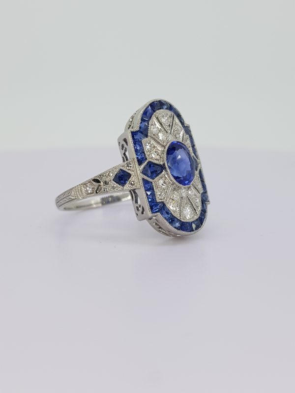 Art Deco Style Sapphire and Diamond Cluster Dress Ring in 18ct White Gold. Sapphire 0.75 carats. Diamonds 1.19 carat total