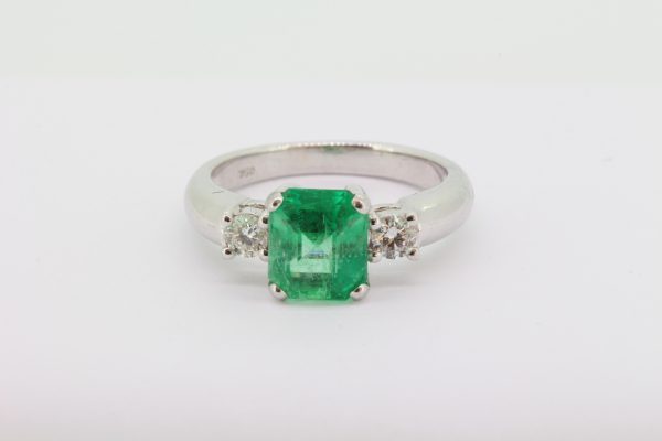 Contemporary 2ct Octagonal Cut Emerald and Diamond Three Stone Ring