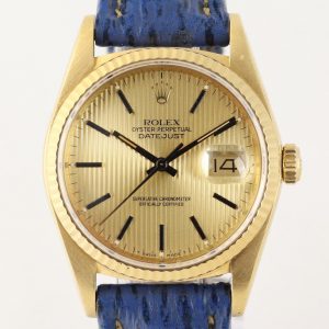 Vintage Rolex Datejust 16018 18ct Yellow Gold Watch with Tapestry Dial, quick-set date, screwdown crown and sapphire glass, automatic movement, on a blue leather strap with Rolex pin buckle, with a Rolex box, Circa 1987