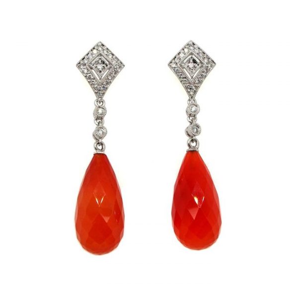 Carnelian and Diamond Drop Earrings; featuring diamond-shaped diamond tops suspending a briolette shaped faceted carnelian via two collet-set diamonds, in 18ct white gold and platinum