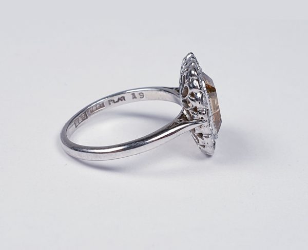 Vintage 1940s Asscher Cut Fancy Diamond Cluster Ring; central 2.76ct golden Asscher cut diamond set within a surround of 0.20cts old cut diamonds