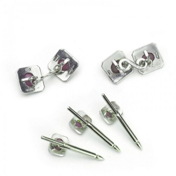 Vintage Tiffany and Co Star Ruby and Platinum Dress Set; comprising a pair of cufflinks and three dress studs, Signed, Circa 1950