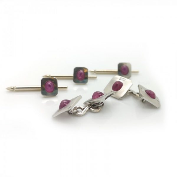 Vintage Tiffany and Co Star Ruby and Platinum Dress Set; comprising a pair of cufflinks and three dress studs, Circa 1950
