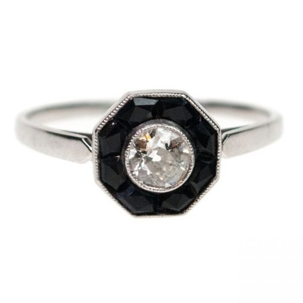 Vintage Old Cut Diamond and Onyx Ring; octagon-shape Art Deco design ring featuring a 0.30ct Old Mine Cut Diamond framed with Onyx, in Platinum