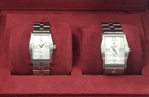 Tudor Archeo His and Hers Watches, Unworn with Box and Papers, both in stainless steel with matching bracelets. Gents automatic model number 30110. Ladies quartz model number 30210