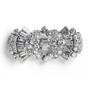 Art Deco Baguette and Brilliant Diamond Brooch in Platinum, set with 4.30 carats of baguette and round brilliant-cut diamonds, Circa 1935