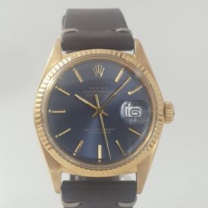 Rare Vintage Rolex Datejust 1601 18ct Yellow Gold Watch with Blue Dial, magnified date at 3, screw-locked crown and Pexiglas crystal, automatic movement, on a leather strap, Circa 1970s