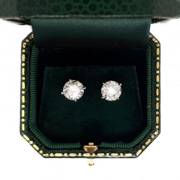 Brilliant Cut Diamond Stud Earrings, 2.80 carat total, each earring claw set with a solitaire round brilliant-cut diamond, mounted in platinum with white gold fittings