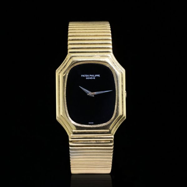 Vintage Patek Philippe 18ct Yellow Gold Manual Wind Watch with Black Onyx Dial, Powered by manual winding movement no 1328620, Circa 1970s