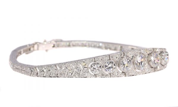 Art Deco Diamond and Platinum Bangle Bracelet, 6.01 carat total, Circa 1920