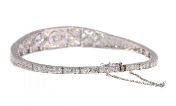 Art Deco Diamond and Platinum Bangle Bracelet, 6.01 carat total, Circa 1920