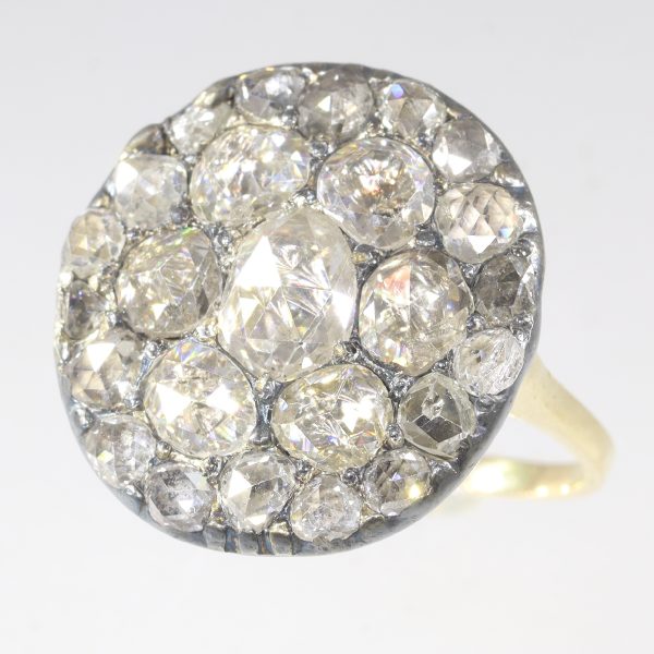Antique Georgian Rose Cut Diamond Cluster Ring; twenty-five foil-backed rose-cut diamonds, in silver and 18ct yellow gold, 18th century, Circa 1780