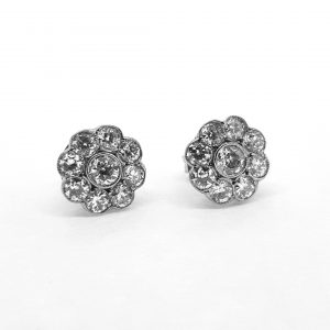 Diamond Flower Cluster Earrings, 1.50 carat total, each featuring a central round cut diamond surrounded by eight further diamonds, in 18ct white gold