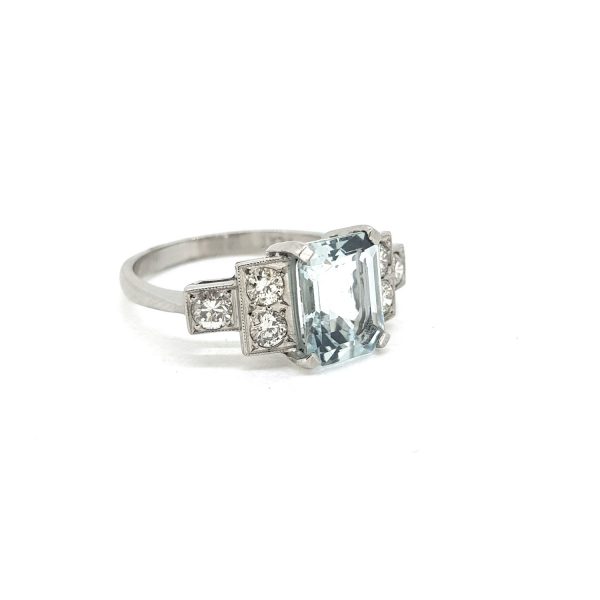 2ct Emerald Cut Aquamarine and Diamond Ring in Platinum; central claw-set aquamarine flanked by 0.50cts diamond-set stepped shoulders